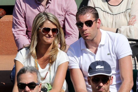 Sylvain Armand et sa femme Guenola lors du quart de finale entre Jo-Wilfried Tsonga et Roger Federer (7-5, 6-3, 6-3) le 4 juin 2013 à Roland-Garros
