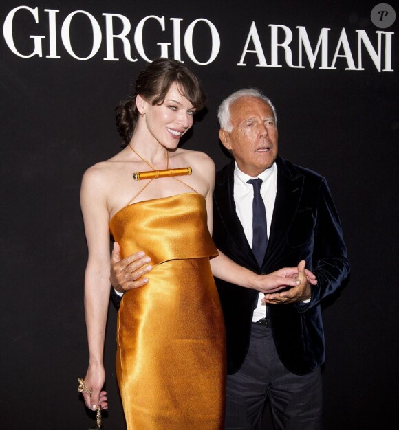 Milla Jovovich et Giorgio Armani à l'exposition Eccentrico à Rome qui célèbre la maison Armani. Le 5 juin 2013