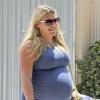 Busy Phillips tres enceinte et son mari Marc Silverstein vont dejeuner a West Hollywood, le 12 juin 2013.  Pregnant Busy Phillips looks ready to burst while lunching with a friend and husband Marc Silverstein at Hugo's in West Hollywood, California on June 12, 2013. The 33 year old mother seemed proud of her pregnancy curves, flaunting them in a tightly fitted blue dress.12/06/2013 - West Hollywood