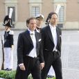 Chris O'Neill et son témoin Cedric Notz avant son mariage avec la princesse Madeleine de Suède au palais royal à Stockholm le 8 juin 2013.