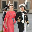La princesse Mary et le prince Frederik de Danemark au mariage de la princesse Madeleine de Suède et de Chris O'Neill au palais royal à Stockholm le 8 juin 2013.