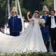 La princesse Madeleine de Suède et son mari Chris O'Neill arrivent à Drottningholm pour la réception de leur mariage, le 8 juin 2013 à Stockholm.