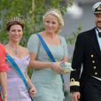 La princesse Mary de Danemark avec la princesse Märtha-Louise, la princesse Mette-Marit et le prince Haakon de Norvège au mariage de la princesse Madeleine de Suède et de Chris O'Neill au palais royal à Stockholm le 8 juin 2013.