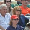 Dominique Strauss Kahn et sa compagne Myriam L'Aouffir regardent la finale dames à Roland-Garros le 8 juin 2013.
