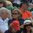 Dominique Strauss Kahn et sa compagne Myriam L'Aouffir lors de la finale dames à Roland-Garros le 8 juin 2013.