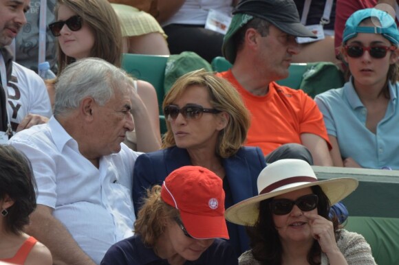 Dominique Strauss Kahn et sa compagne Myriam L'Aouffir lors de la finale dames à Roland-Garros le 8 juin 2013.