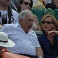 DSK et sa compagne Myriam L'Aouffir lors de la finale dames à Roland-Garros le 8 juin 2013.