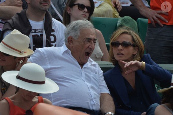 DSK et sa compagne Myriam L'Aouffir lors de la finale dames à Roland-Garros le 8 juin 2013.