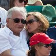 Dominique Strauss-Kahn et sa girlfriend Myriam L'Aouffir lors de la finale dames à Roland-Garros le 8 juin 2013.