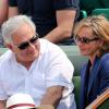 Dominique Strauss Kahn et sa compagne Myriam L'Aouffir à Roland Garros le 8 juin 2013.