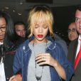 Rihanna, escortée par son amie Melissa Forde, quitte le restaurant San Carlo à Manchester. Le 11 juin 2013.
