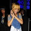 Rihanna, souriante et accompagnée de Melissa Forde, quitte le restaurant/bowling All Star Lane à Manchester. Le 12 juin 2013.