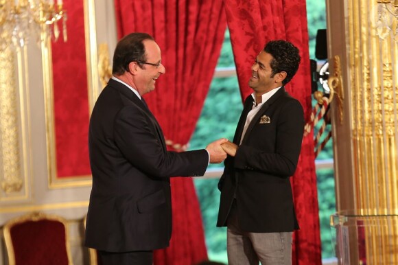 Francois Hollande et Jamel Debbouze lors de la remise du prix de l'Education Artistique et Culturelle à l'Elysée, le 12 Juin 2013.