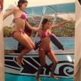 Instagram Kim Kardashian - Flashback Friday - @kourtneykardash &amp; I jumping off s boat in Bora Bora