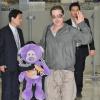 Brad Pitt et son fils Pax Jolie-Pitt arrivant en Corée du Sud le 11 juin 2013