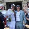 Sortie sous le riz pour le mariage civil de Thomas Langmann et Céline Bosquet à la mairie de Sartène, Corse du sud, le 21 juin 2013.
