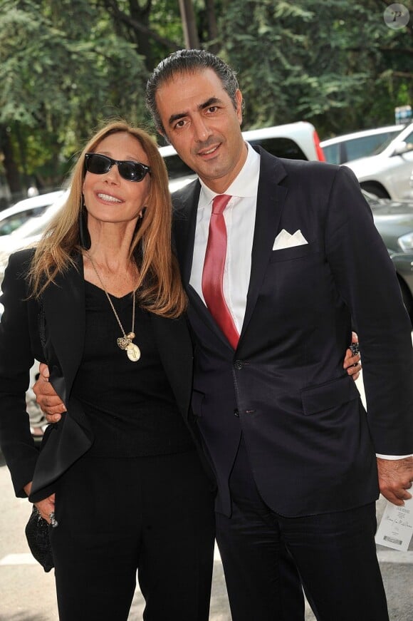 Marisa Berenson et Jean Michel Simonian au défilé Dior Homme printemps-été 2014 à Paris, le 29 juin 2013.