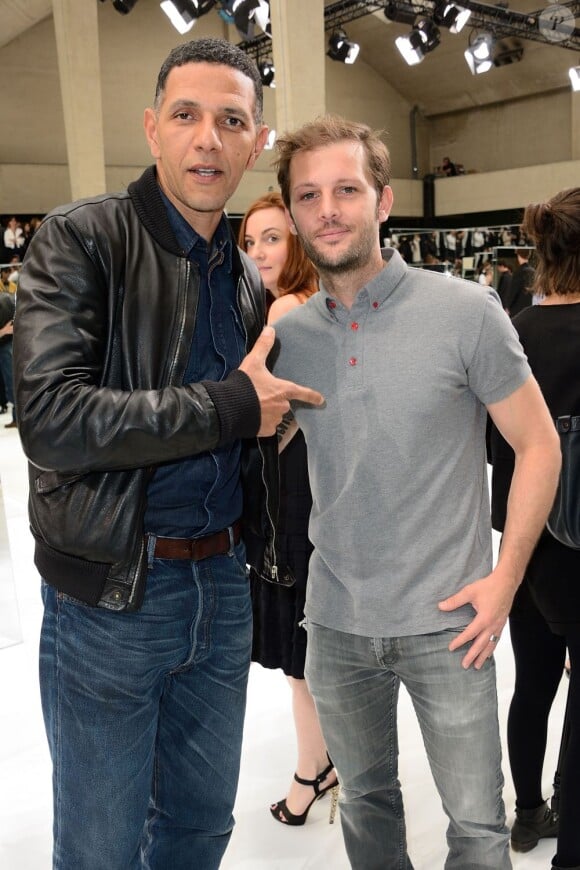 Roschdy Zem et Nicolas Duvauchelle au défilé Dior Homme printemps-été 2014 à Paris, le 29 juin 2013.