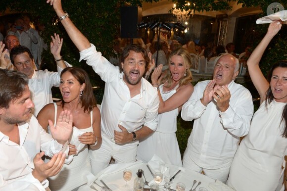 Exclusif - Henri Leconte, son épouse Florentine, Christian Bîmes et sa femme, à la Soirée blanche organisée par le chef Christophe Leroy, aux Moulins de Ramatuelle, le dimanche 7 juillet 2013.