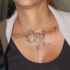 Halle Berry arbore son tatouage oriental de la soirée de dimanche à l'aéroport de Los Angeles, le 16 juillet 2013.