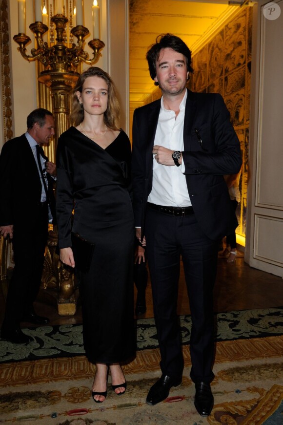 Natalia Vodianova et Antoine Arnault au ministère de la Culture où Bono a reçu les insignes de Commandeur de l'ordre des Arts et des Lettres, à Paris le 16 juillet 2013.