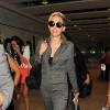 Miley Cyrus arrive à l'aéroport Heathrow de Londres, le 17 juillet 2013.