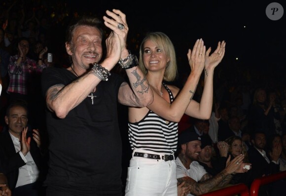 Johnny et Laeticia Hallyday assistent au concert de Patrick Bruel à Bercy. Paris, le 22 juin 2013.