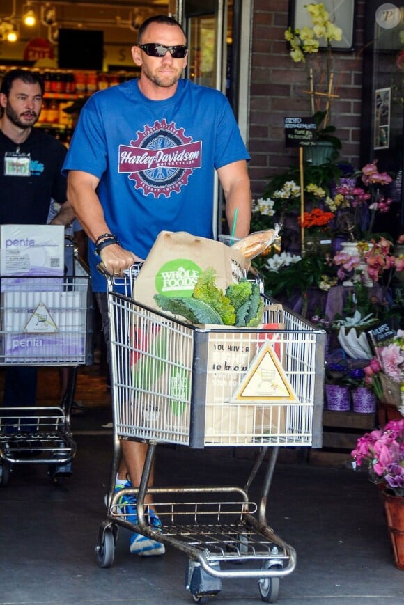 Heidi Klum et son petit ami Martin Kristen font du shopping à Brentwood avec les fils d'Heidi (Henry et Johan) à Brentwood, le 27 juillet 2013.