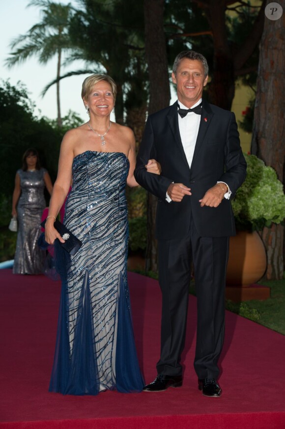 Le président du Conseil d'Etat et Secrétaire Général de la Croix-Rouge Monégasque et Mme Philippe Narmino - 65e bal de la Croix-Rouge au sporting de Monte-Carlo, le 2 août 2013.