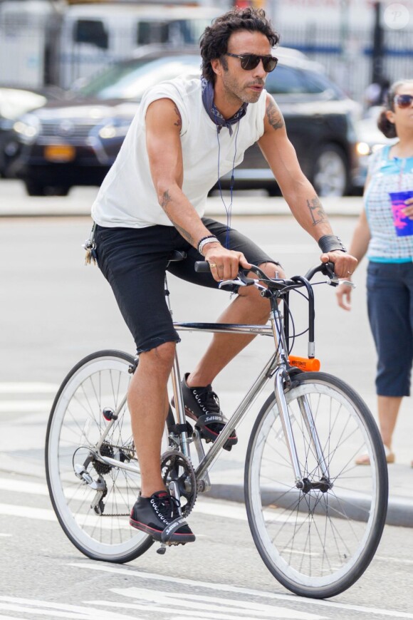 Carlos Leon et sa femme Betina Holte font du vélo à New York. Dimanche 4 août 2013.