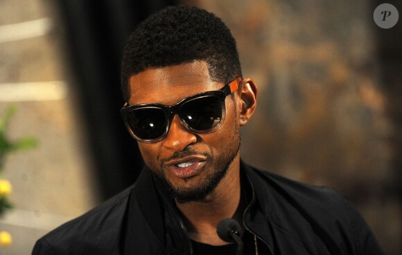 Le chanteur Usher visite l'Empire State Building à New York. Le 3 juillet 2013.