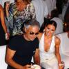 Elisabetta Gregoraci et Andrea Bocelli assistent à la White Night Party de Fawaz Gruosi, fondateur et président de la marque de Grisogono, qui fête son 61e anniversaire au Billionaire. Porto Cervo, le 8 août 2013.