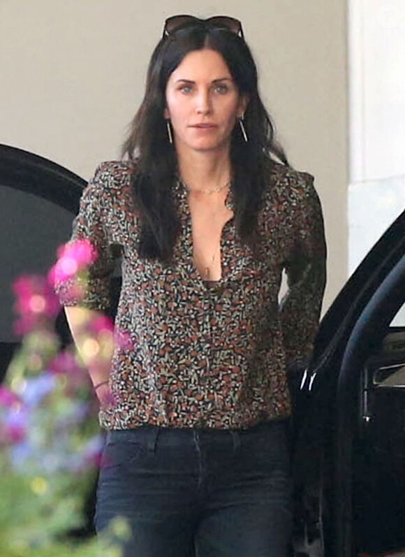 Exclusif - Courteney Cox arrive à son hôtel à Beverly Hills, le 11 mars 2013.