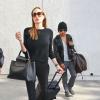 Angelina Jolie et son fils Maddox croisés à l'aéroport de Los Angeles le 15 aout 2013.