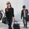 Angelina Jolie et son très stylé fils Maddox à l'aéroport de Los Angeles le 15 aout 2013.