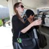 PAngelina Jolie et Maddox à l'aéroport de Los Angeles le 15 aout 2013.