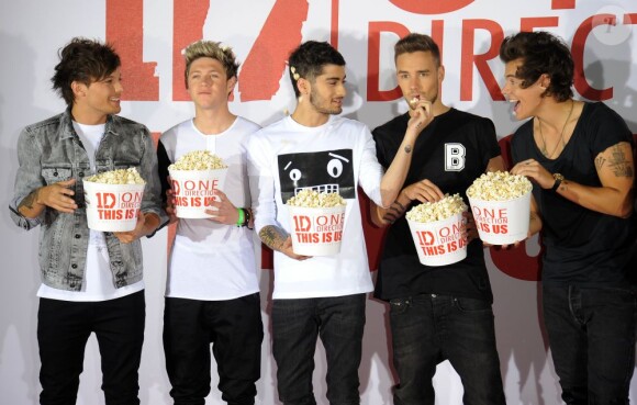 Le groupe phénomène One Direction présente le film This Is Us à Londres, le 19 août 2013.