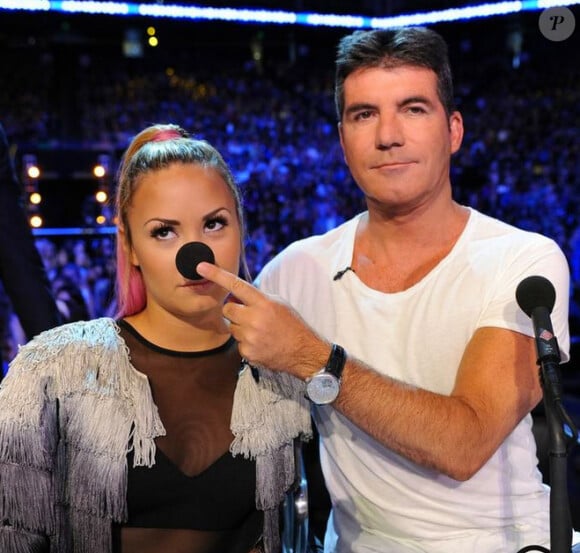 Simon Cowell et Demi Lovato dans la prochaine saison de X Factor USA, diffusée à partir de septembre 2013.