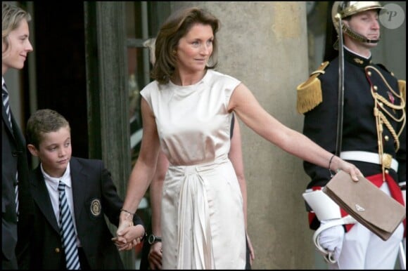 Pierre Sarkozy, Louis Sarkozy et Cécilia Attias à l'Elysée le 16 mai 2007.