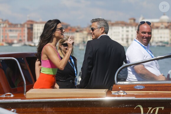 Sandra Bullock et George Clooney complices au 70e festival du film de Venise, le 28 août 2013.
