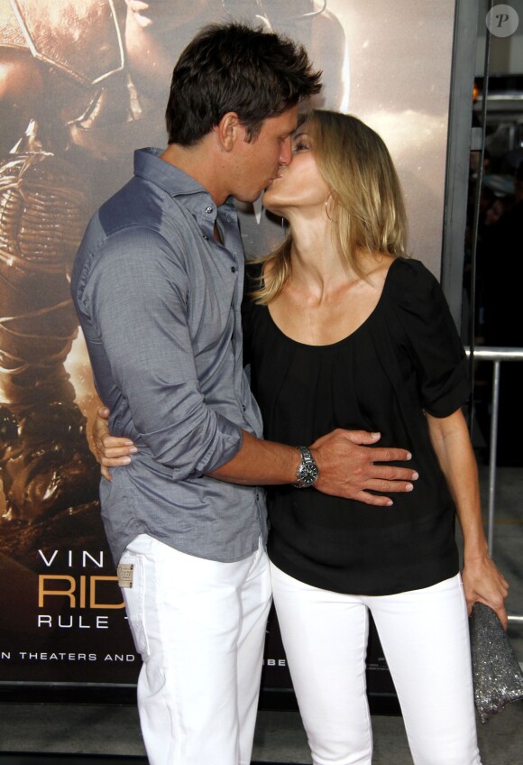 Michael Trucco, Sandra Hess à la première du film "Riddick" à Westwood, le 28 août 2013.