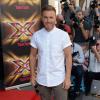 Gary Barlow lors du lancement de X Factor UK 2013 à l'hôtel Mayfair de Londres, le 29 août 2013.
