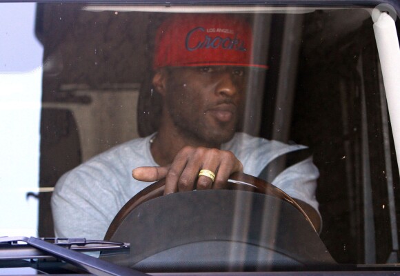 Lamar Odom, surpris au volant de son 4x4 Mercedes-Benz à Los Angeles, le 28 août 2013. Ce vendredi 30, le basketteur a été arrêté pour conduite sous influence.
