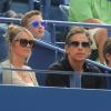 Le comédien Ben Stiller et sa femme Christine Taylor lors de l'US Open 2013 à New York le 1er septembre 2013.