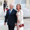 Michel Sapin et sa femme lors d'un dîner d'Etat à l'Elysée le 3 septembre 2013.