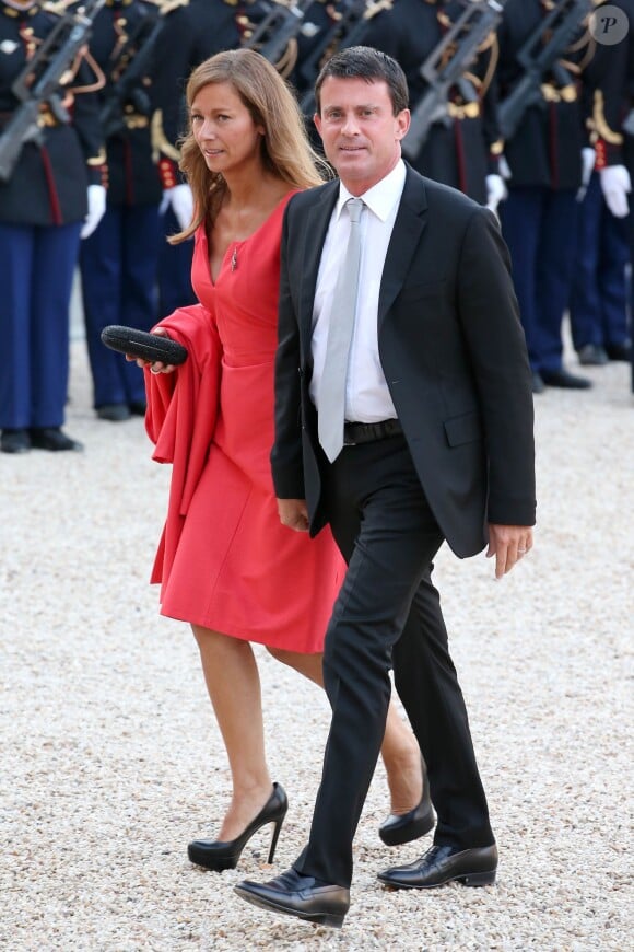 Manuel Valls et sa femme Anne Gravoin lors d'un dîner d'Etat à l'Elysée le 3 septembre 2013.