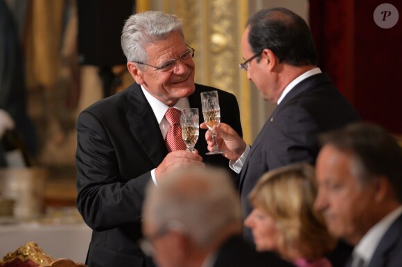 François Hollande et le président allemand Joachim Gauck lors d'un dîner d'Etat à l'Elysée le 3 septembre 2013.