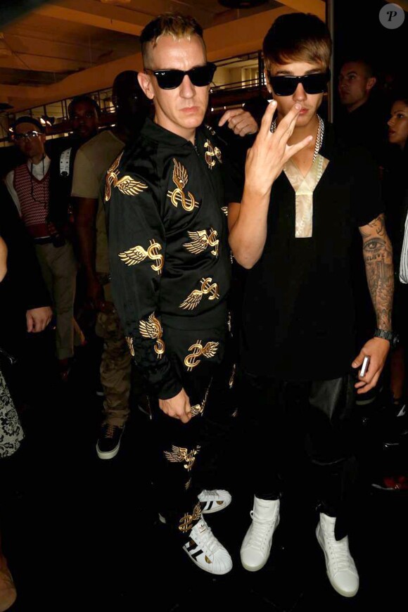 Le chanteur Justin Bieber et Jeremy Scott au défilé de mode Y-3, lors de la Fashion Week de New York, le 7 septembre 2013.