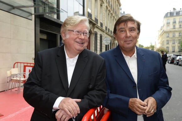 André Torrent et Jean-Pierre Foucault lors de la conférence de presse de rentrée de RTL le 10 septembre 2013, à Paris