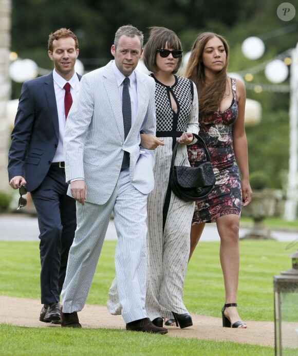 Lily Allen et son mari Sam Cooper assistent au mariage du rappeur Stephen Paul Manderson alias Professor Green et Millie Mackintosh dans le Somerset, le 10 septembre 2013.